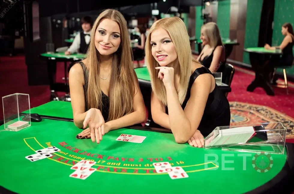 Ruang meja live DOMINO4D dengan suasana kasino dan dealer